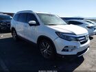 2017 Honda Pilot Touring Белый vin: 5FNYF5H93HB025148