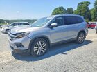 2018 Honda Pilot Touring Серебряный vin: 5FNYF5H96JB014215