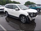2018 Honda Pilot Touring White vin: 5FNYF6H92JB066608