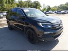 2018 Honda Pilot Touring Черный vin: 5FNYF6H94JB063547