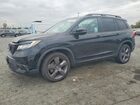 2021 Honda Passport Touring Black vin: 5FNYF7H91MB006054