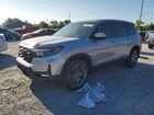 2023 Honda Passport Exl Серебряный vin: 5FNYF8H59PB028942
