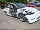2020 Tesla Model Y Long Range Dual Motor All-wheel Drive White vin: 5YJYGDEE1LF057114