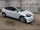 2020 Tesla Model Y Long Range Dual Motor All-wheel Drive White vin: 5YJYGDEE7LF017054