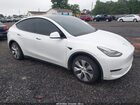 2022 Tesla Model Y Long Range Dual Motor All-wheel Drive White vin: 7SAYGAEE1NF363802