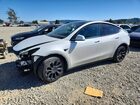 2024 Tesla Model Y White vin: 7SAYGAEE2RF008613