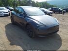 2024 Tesla Model Y Long Range Dual Motor All-wheel Drive Gray vin: 7SAYGAEE4RF108681