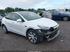 2022 Tesla Model Y Long Range Dual Motor All-wheel Drive White vin: 7SAYGAEE5NF377881