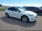 2023 Tesla Model Y Awd/long Range Dual Motor All-wheel Drive White vin: 7SAYGAEE5PF629549