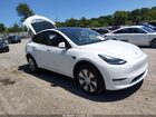 2023 Tesla Model Y Awd/long Range Dual Motor All-wheel Drive White vin: 7SAYGAEE5PF703083