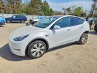 2023 Tesla Model Y Белый vin: 7SAYGAEE6PF599137