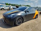 2024 Tesla Model Y Two Tone vin: 7SAYGAEE6RF029884