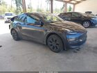 2024 Tesla Model Y Long Range Dual Motor All-wheel Drive Gray vin: 7SAYGAEE8RF170164