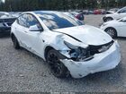 2023 Tesla Model Y Awd/long Range Dual Motor All-wheel Drive White vin: 7SAYGAEE9PF884124
