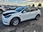 2024 Tesla Model Y Белый vin: 7SAYGDED0RF055390