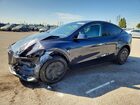 2026 Tesla Model Y Gray vin: 7SAYGDED0TA603277