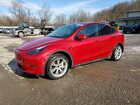 2023 Tesla Model Y Burgundy vin: 7SAYGDED1PF959875