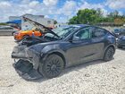 2024 Tesla Model Y Black vin: 7SAYGDED1RF034256