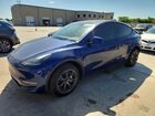 2024 Tesla Model Y Blue vin: 7SAYGDED2RF155667