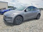 2026 Tesla Model Y Charcoal vin: 7SAYGDED2TF525166