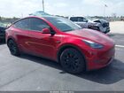 2024 Tesla Model Y   Красный vin: 7SAYGDED6RF155977