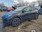 2024 Tesla Model Y Black vin: 7SAYGDED8RF230355