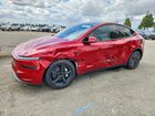 2026 Tesla Model Y Red vin: 7SAYGDED8TF613722