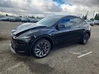 2026 Tesla Model Y Black vin: 7SAYGDED8TF616202