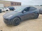 2024 Tesla Model Y Gray vin: 7SAYGDEE0RF024973