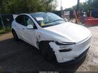 2026 Tesla Model Y All-wheel Drive/long Range Launch Series/premium All-wheel Drive White vin: 7SAYGDEE0TF557333