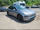 2026 Tesla Model Y All-wheel Drive/long Range Launch Series/premium All-wheel Drive Gray vin: 7SAYGDEE0TF579509