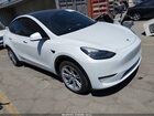2023 Tesla Model Y Awd/long Range Dual Motor All-wheel Drive White vin: 7SAYGDEE1PA094752