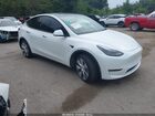 2023 Tesla Model Y Awd/long Range Dual Motor All-wheel Drive Белый vin: 7SAYGDEE1PF668415