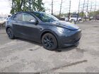 2024 Tesla Model Y Long Range Dual Motor All-wheel Drive Gray vin: 7SAYGDEE1RA329265