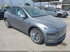 2026 Tesla Model Y All-wheel Drive/long Range Launch Series/premium All-wheel Drive Silver vin: 7SAYGDEE1TF439758