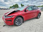 2026 Tesla Model Y Red vin: 7SAYGDEE1TF607799