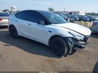 2022 Tesla Model Y Long Range Dual Motor All-wheel Drive White vin: 7SAYGDEE2NA014498