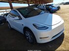 2023 Tesla Model Y   White vin: 7SAYGDEE2PA093190
