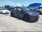 2024 Tesla Model Y Long Range Dual Motor All-wheel Drive Gray vin: 7SAYGDEE2RA255659