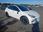 2023 Tesla Model Y Awd/long Range Dual Motor All-wheel Drive White vin: 7SAYGDEE4PA113178