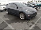 2023 Tesla Model Y Awd/long Range Dual Motor All-wheel Drive Gray vin: 7SAYGDEE4PF898403
