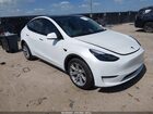 2024 Tesla Model Y Long Range Dual Motor All-wheel Drive White vin: 7SAYGDEE4RA291014