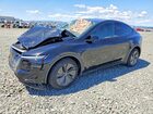 2026 Tesla Model Y Black vin: 7SAYGDEE4TF587516
