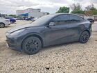 2024 Tesla Model Y Gray vin: 7SAYGDEE5RF037184