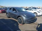 2023 Tesla Model Y Awd/long Range Dual Motor All-wheel Drive Gray vin: 7SAYGDEE6PA210950
