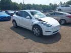 2022 Tesla Model Y Long Range Dual Motor All-wheel Drive White vin: 7SAYGDEE7NA009992