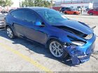 2024 Tesla Model Y Long Range Dual Motor All-wheel Drive Blue vin: 7SAYGDEE7RF007703