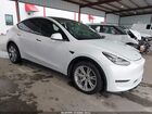 2023 Tesla Model Y Awd/long Range Dual Motor All-wheel Drive White vin: 7SAYGDEE8PA094148