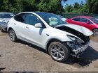 2023 Tesla Model Y Awd/long Range Dual Motor All-wheel Drive White vin: 7SAYGDEE8PF809819
