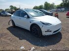 2025 Tesla Model Y Long Range Dual Motor All-wheel Drive White vin: 7SAYGDEE8SF245260
